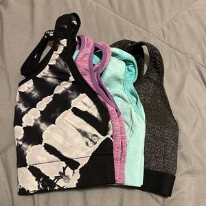 4 sports bras bundle! Light support. No pads. Like new. Xs-s